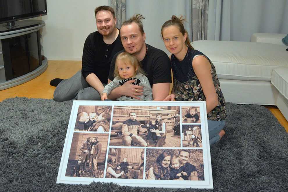 Myllymäen perhe ja Pasi Aittokumpu canvas-taulun kanssa Myllymäen perhe ja Pasi Aittokumpu canvas-taulun kanssa